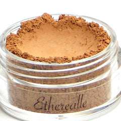 Etherealle powder makeup in a clear jar with tan and brown powder