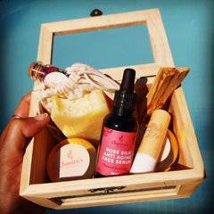 Gift set with wooden box, assorted items, and Chanita's Naturals branding visible