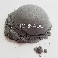 Close-up of Tornado Eye Shadow palette showing vibrant matte and shimmer powder textures in bold shades