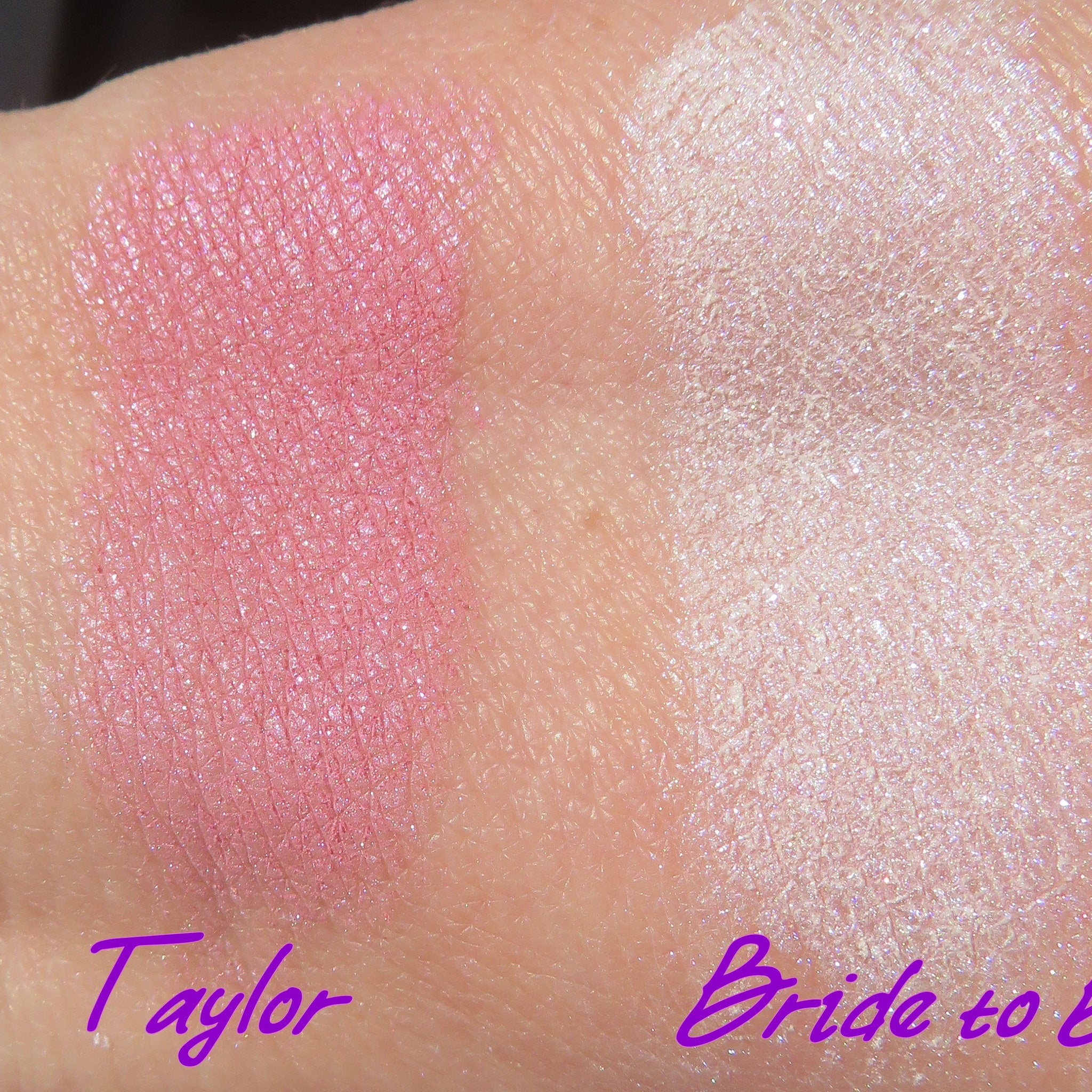 Side view of loose mineral eyeshadow in pale pink shimmer, showcasing fine powder texture in glass jar