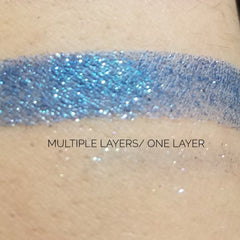 Close-up of NYX Professional Eye Shadow pan showing vibrant pigmented powder in a sleek black compact