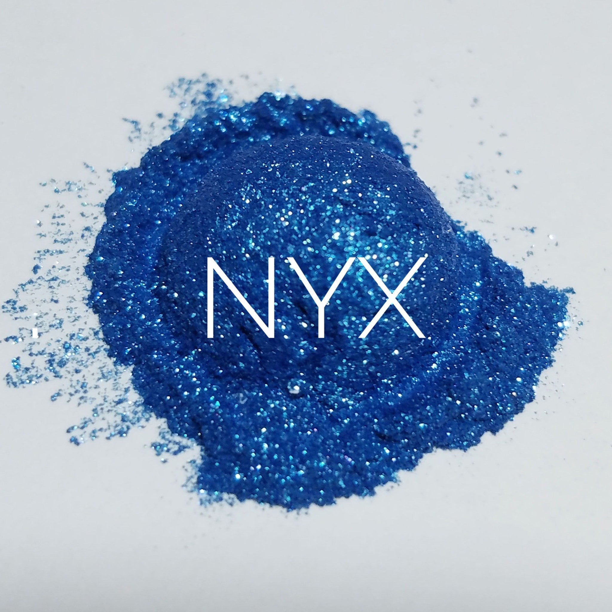 NYX Professional Makeup Eye Shadow palette with six matte and shimmer shades in neutral tones, displayed open