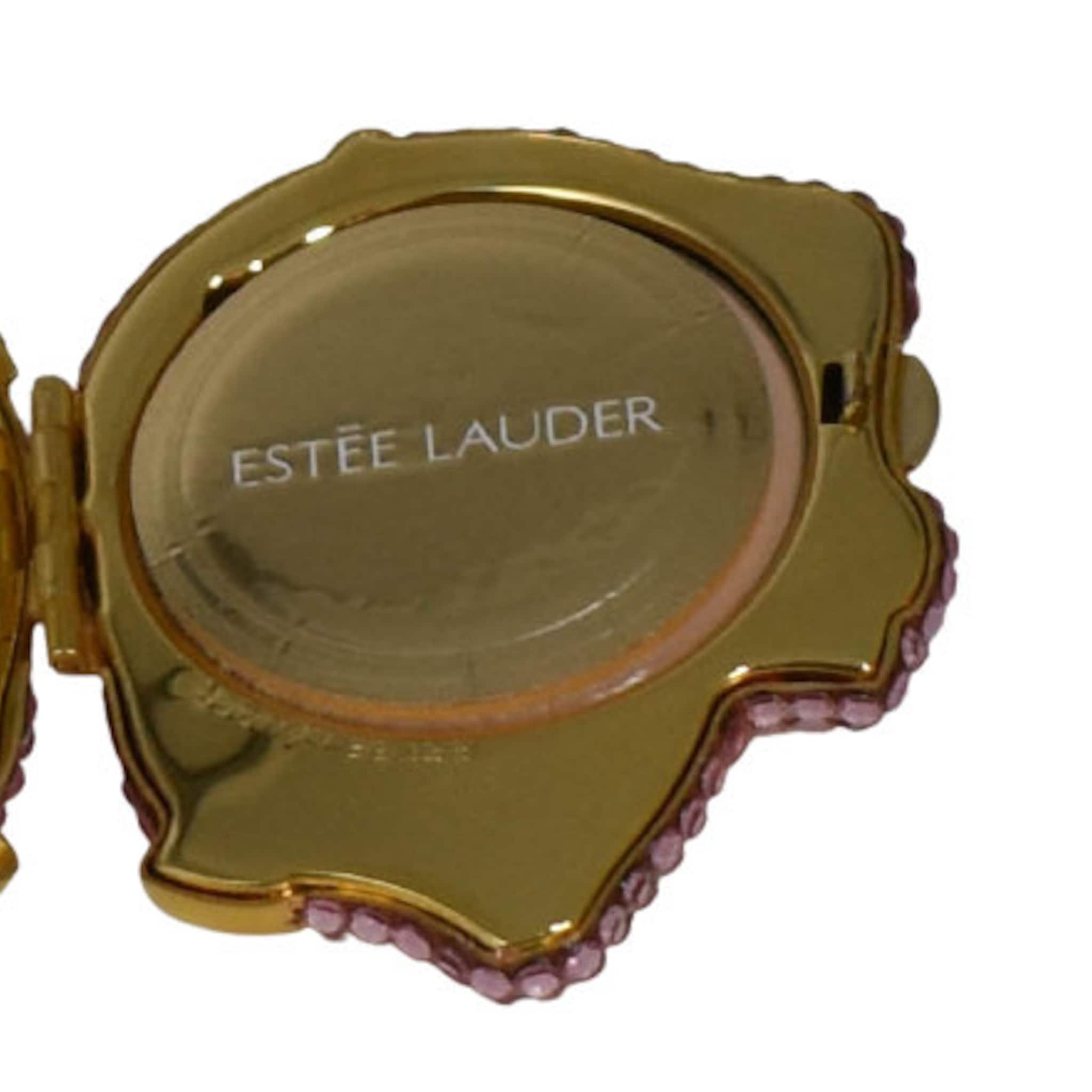 Estée Lauder compact mirror, gold metal with pink crystal accents, open view