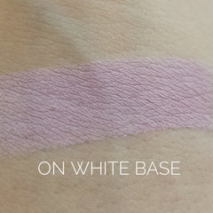 Close-up of Naive Eye Shadow palette showing four matte shades in warm nude tones with smooth, blendable texture