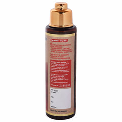 Brown bottle with gold cap, tan label, and text for normal to dry skin