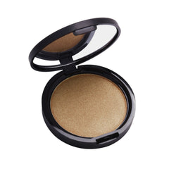 Close-up of shimmering highlighter powder in a compact with reflective gold packaging and embossed logo
