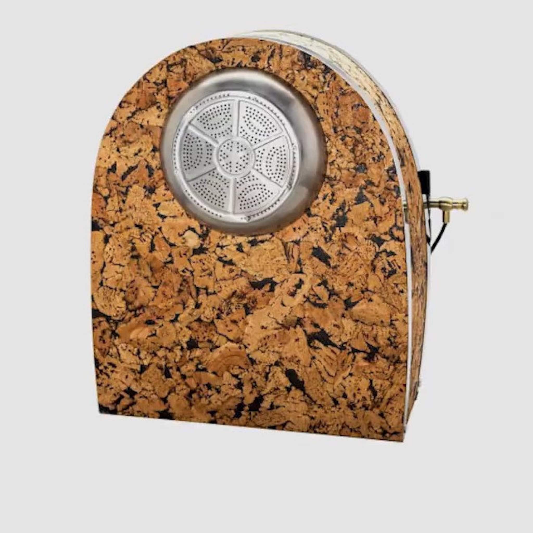 Cork appliance with stainless steel front and brass fixtures, natural wood pattern