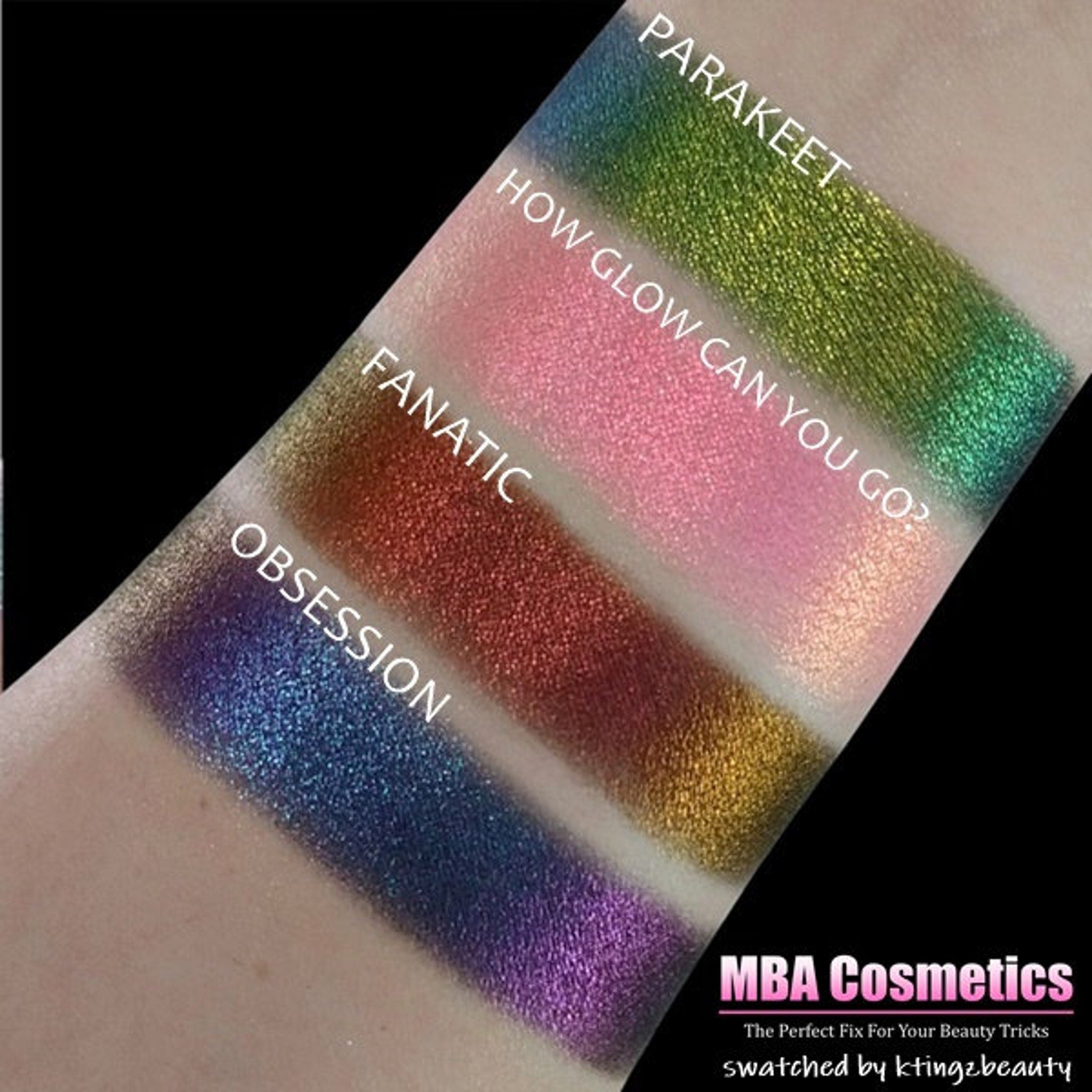Side view of Chromadescent eyeshadow pot showing multi-chrome shift from violet to emerald in compact black case