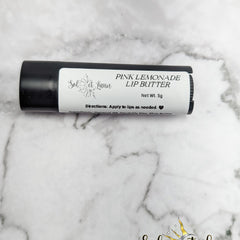 Lip butter tube, black container, white label, SOLETLUNA brand, for lip care