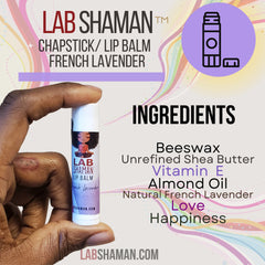 Lip balm tube with white and purple label, held in hand, LAB SHAMAN text visible
