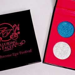 Duochrome eyeshadow palette with blue and white shimmer shades on pink, Alluring Faces Cosmetics brand