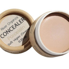Close-up of creamy vegan concealer palette showing smooth matte texture in neutral beige tones