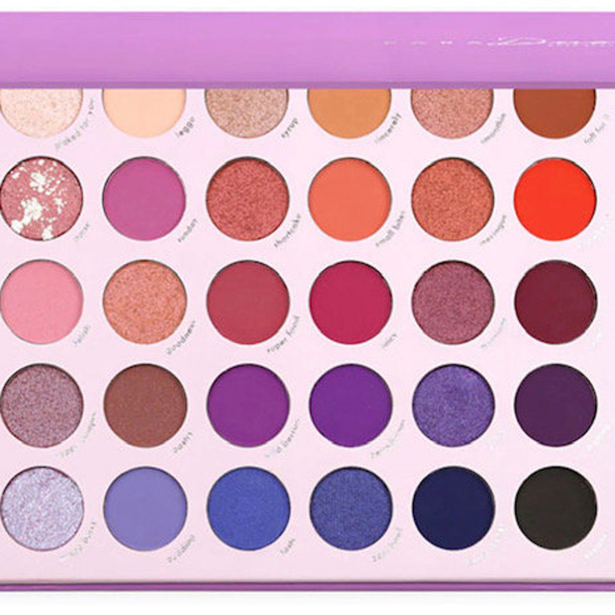 Close-up of Kara Beauty Berry Good palette showing 12 vibrant matte and shimmer eyeshadows in berry tones with mirror