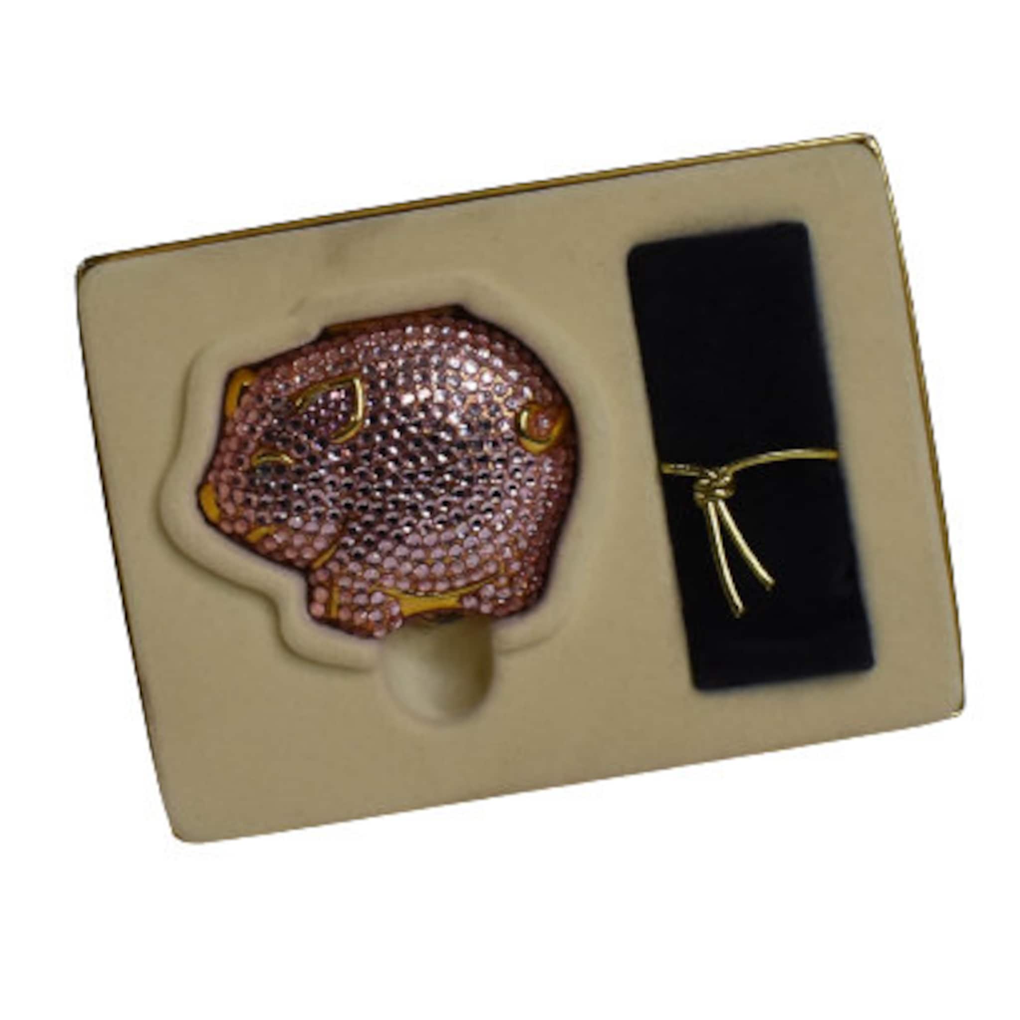 Pig figurine with pink crystal pattern and gold accents in a gift box