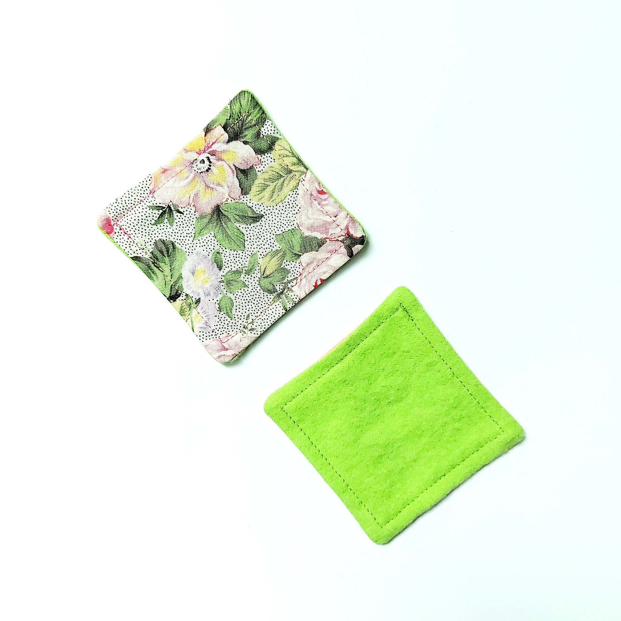 Coasters floral print and solid green fabric square shape on white background