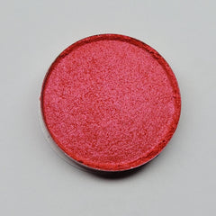 Close-up of Gracidea hot pink and red eyeshadow palette with vibrant matte finish