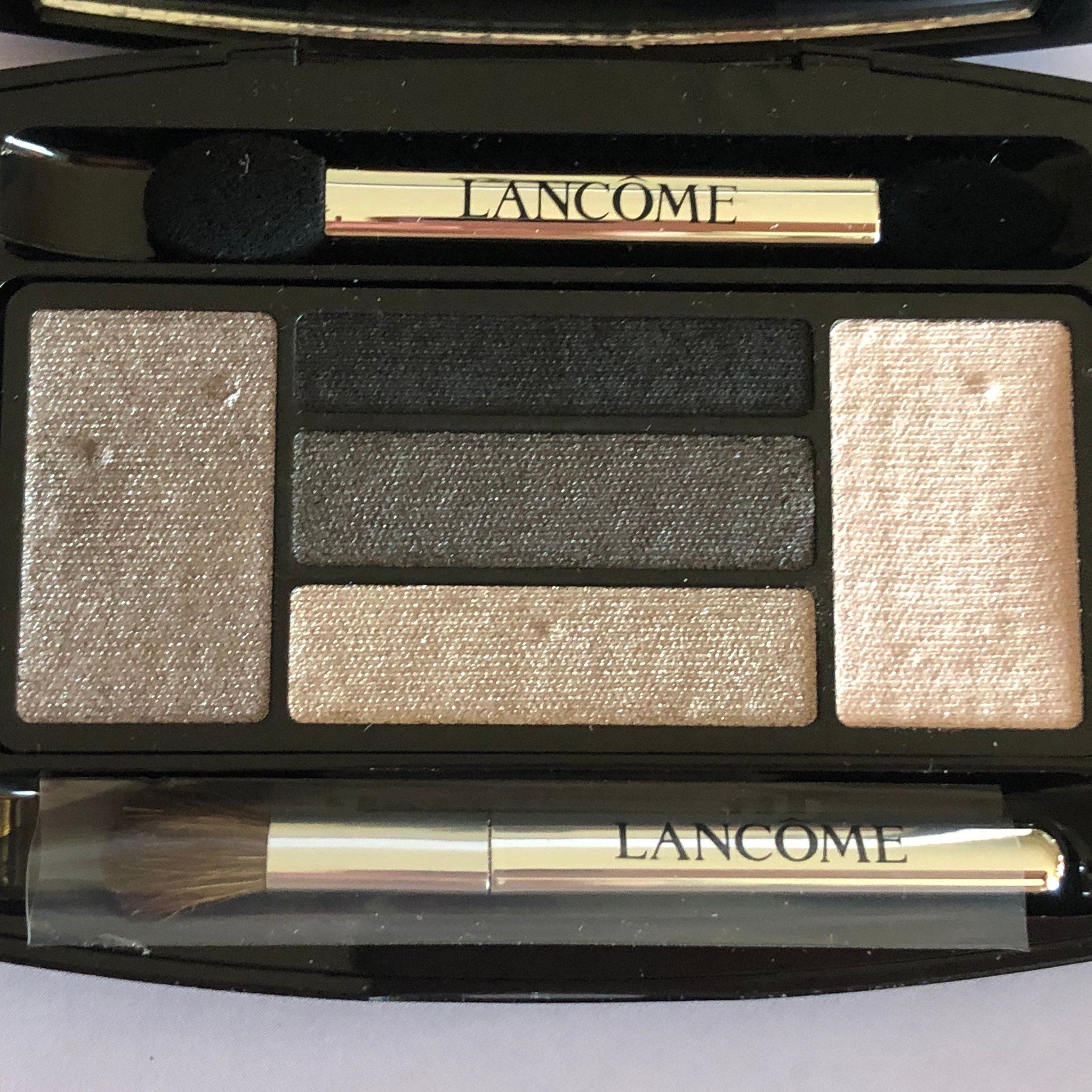 Special edition LANCÔME x Alber Elbaz eye shadow duo showcasing shimmering blue and matte taupe shades in sleek mirrored compact