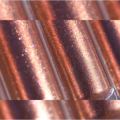 Side view of Molten Shadow Diamond Luxe eyeshadow pot showcasing metallic finish and faceted packaging design
