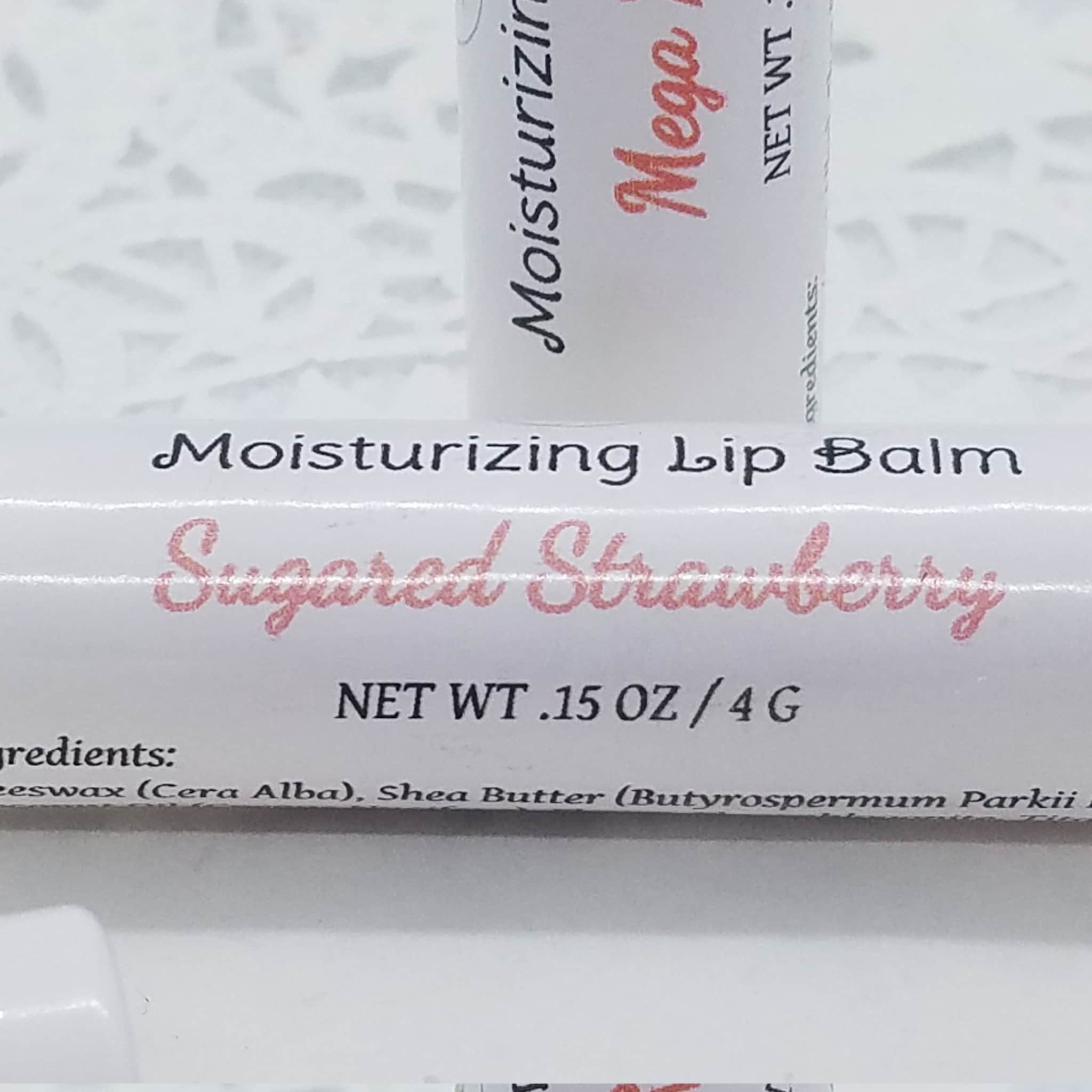 Moisturizing Lip Balm with white and pink text, Sugared Strawberry flavor, Mellen Patch Soaps
