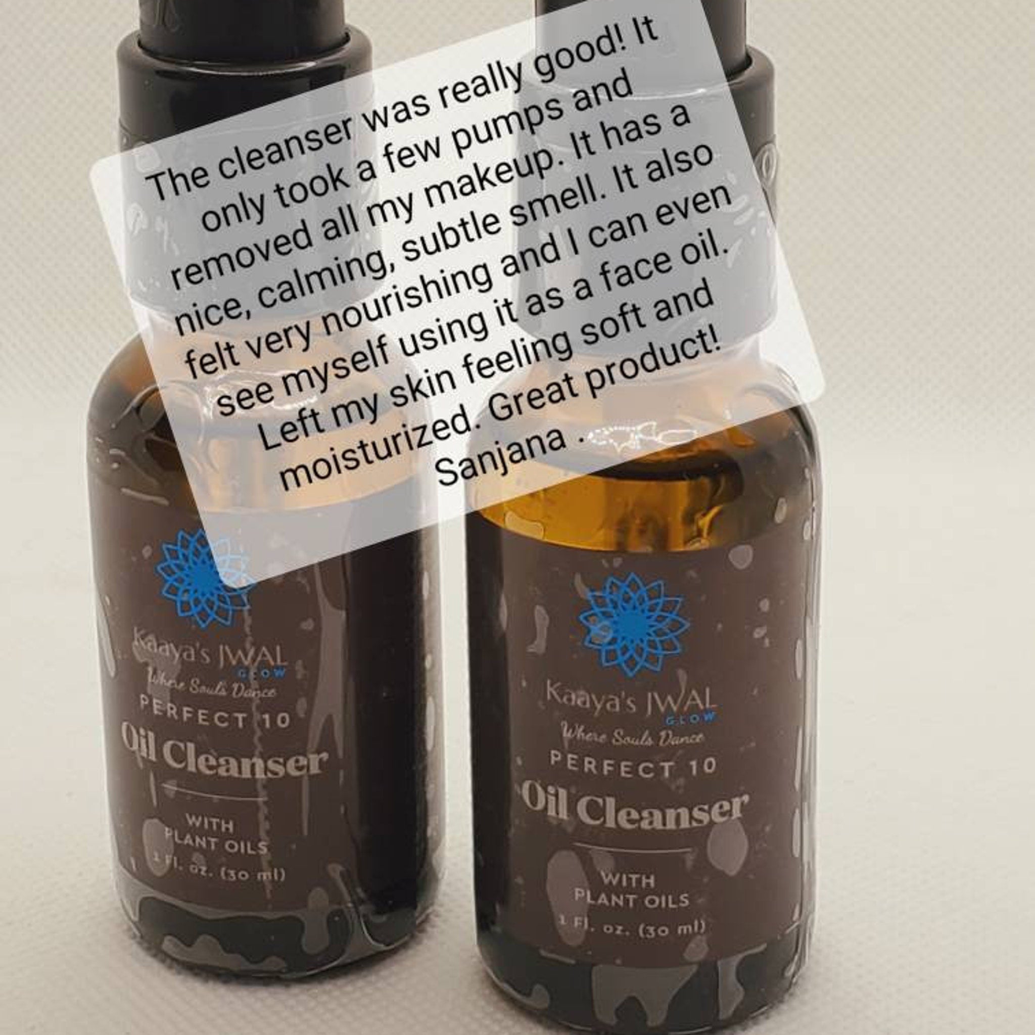 Oil cleanser bottles, brown glass with black pump tops, Kaaya's JWAL brand name visible