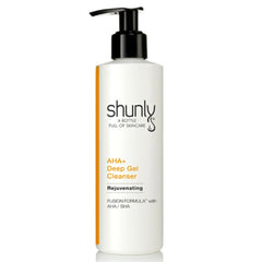 Facial Cleanser bottle, white with black pump, Shunly Skincare branding and orange accent stripe
