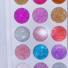 Close-up of shimmering glitter eye shadow palette with vibrant rainbow hues and smooth powder texture