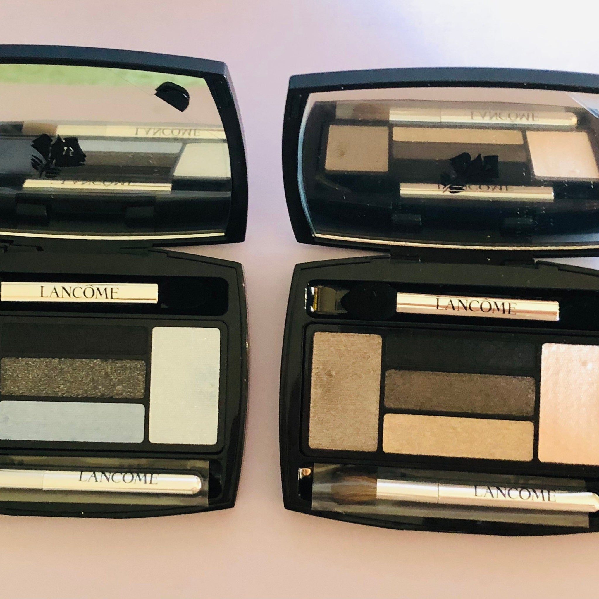 LANCÔME x Alber Elbaz taupe eyeshadow palette in sleek black packaging with gold lettering and ribbon detail