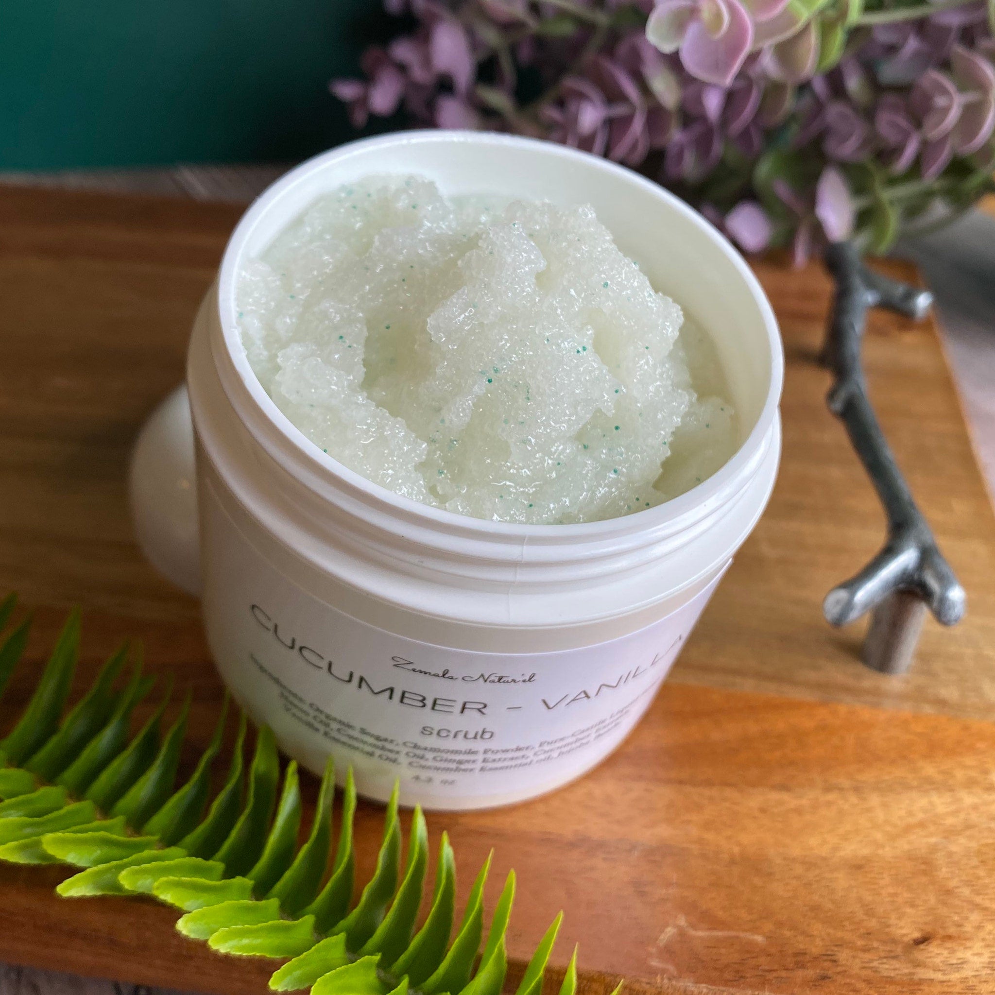 Scrub in white jar with green flecks, cucumber vanilla scent, Zemala Natur'el branding