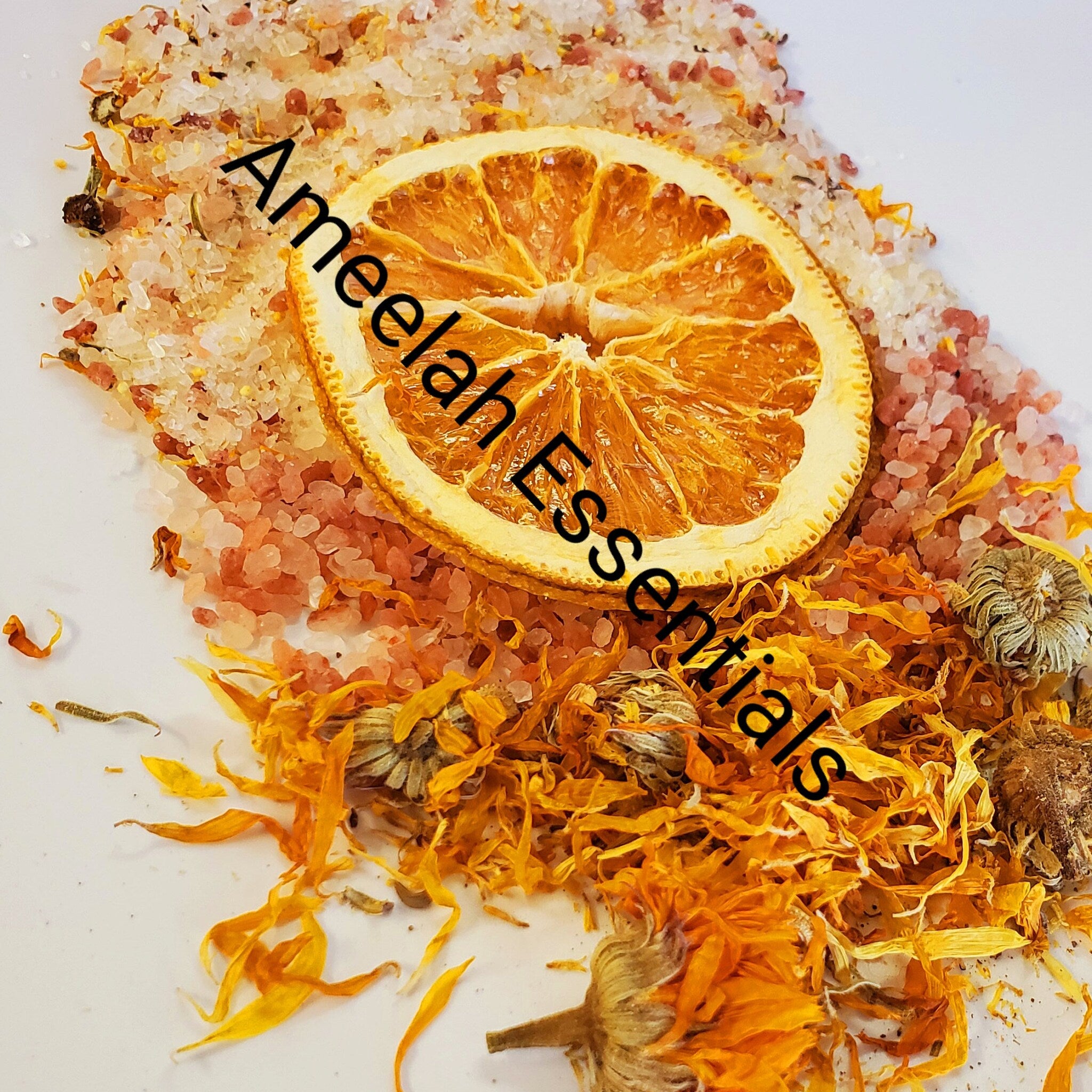Dried orange slice with orange petals and pink salt, Ameelah Essentials branding