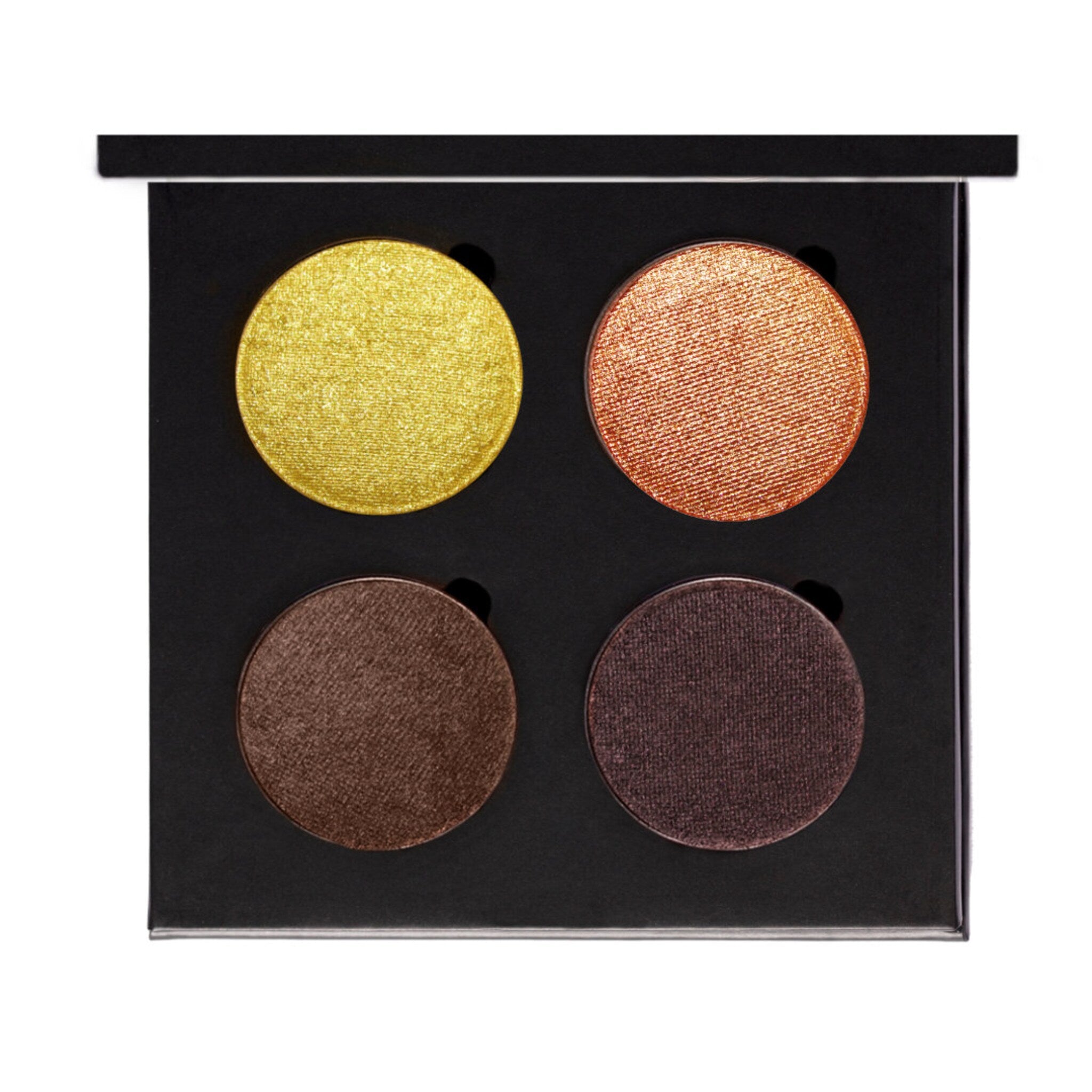 Close-up of pressed powder eyeshadow pan showing rich pigment texture and smooth finish