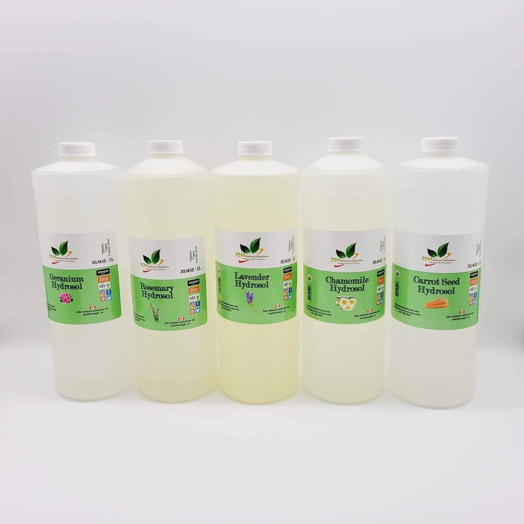 Hydrosol bottles, clear plastic with white lids, various colored labels, JSM Natural Solutions brand displayed