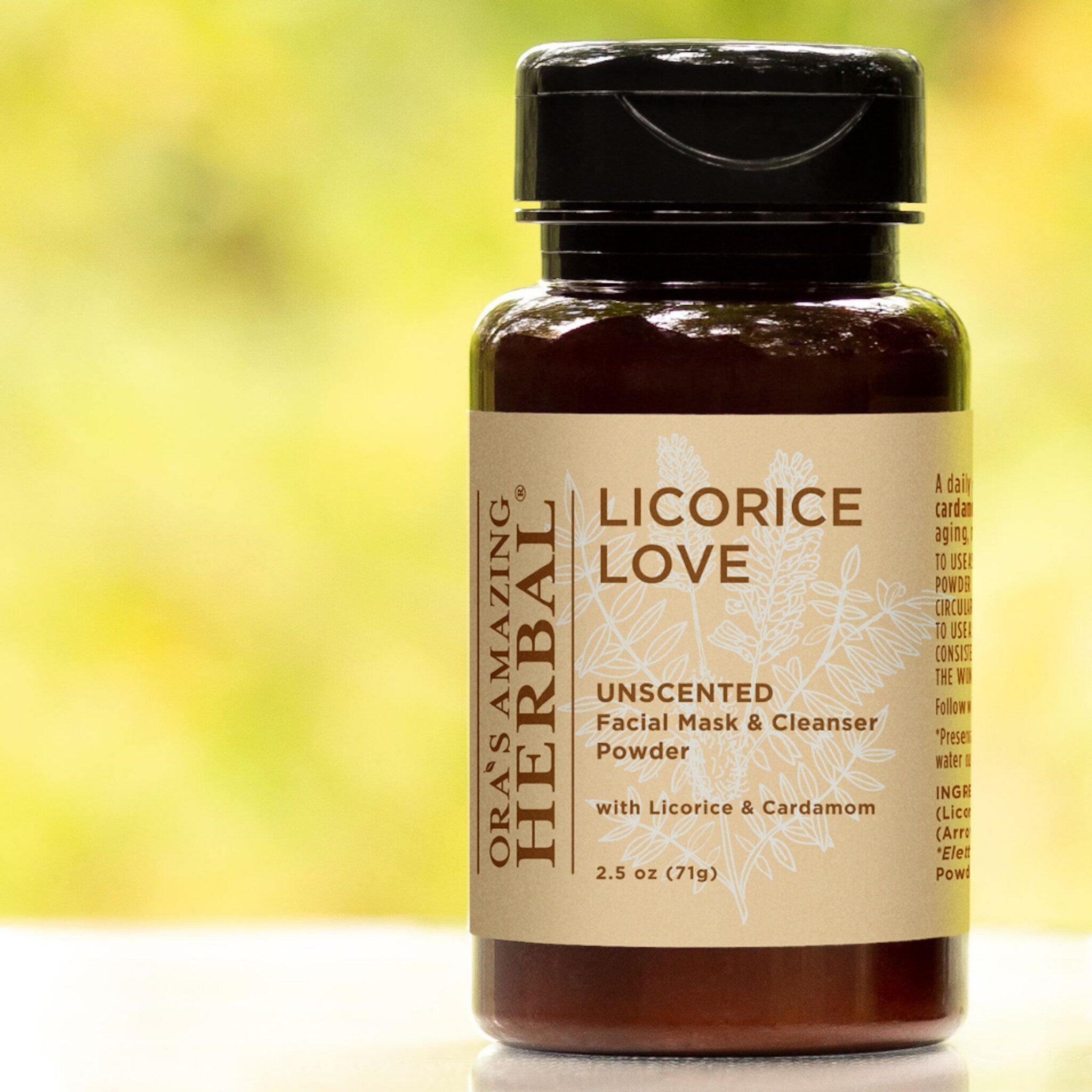 Facial mask powder bottle, brown glass, black cap, Ora's Amazing Herbal label with text and botanical design
