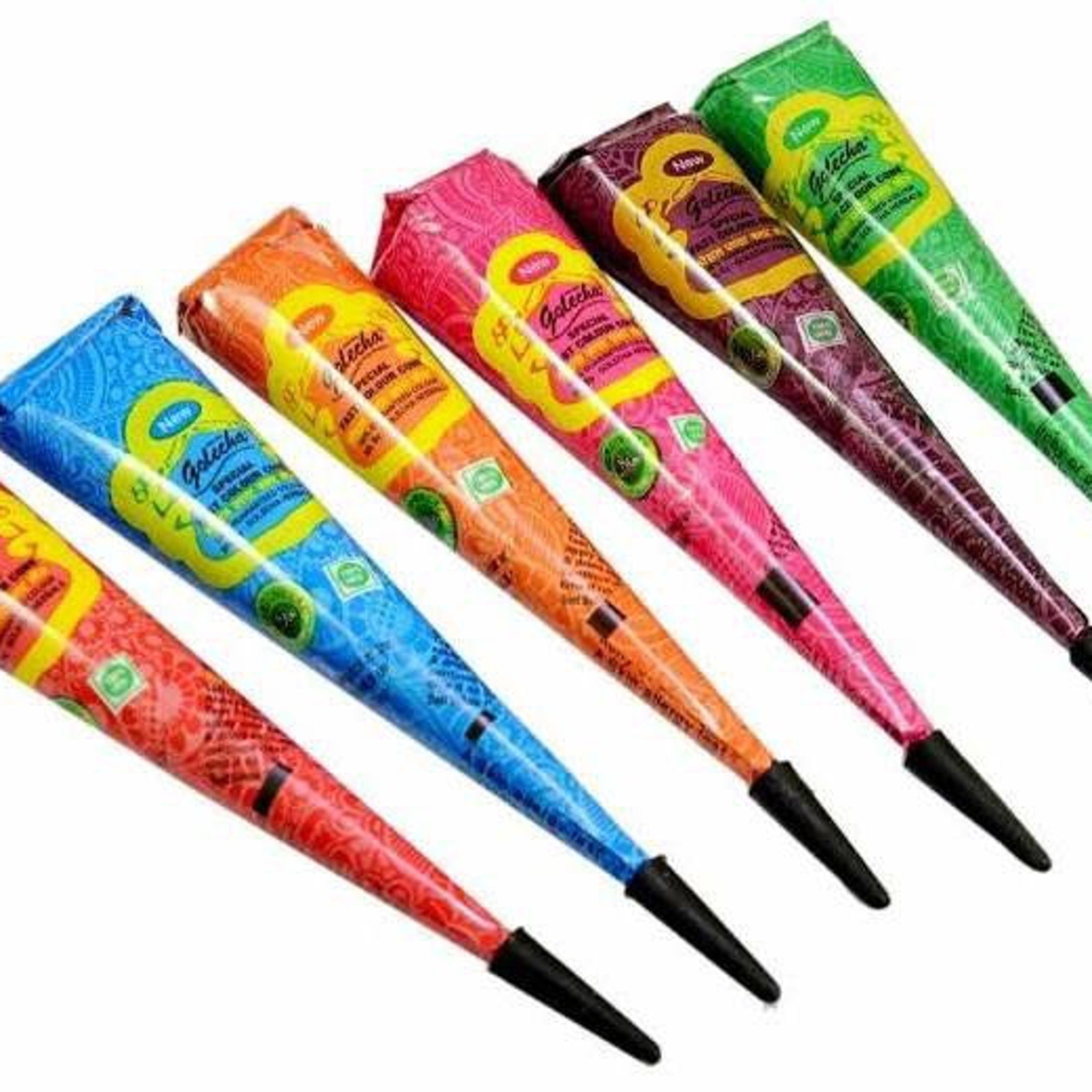 Six vibrant vegan henna paste cones in purple, red, magenta, orange, green, and blue displayed on marble surface