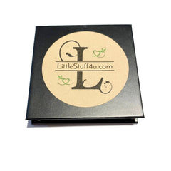 Side view of Day Dream pressed mineral eye shadow compact showing smooth matte finish and neutral beige tone
