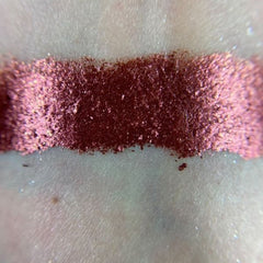 Gravity Eye Shadow Palette with 12 matte and shimmer shades in neutral browns and soft pinks, square compact