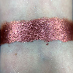 Side view of Gravity Eye Shadow Palette showing matte and shimmer shades in warm bronze and taupe tones