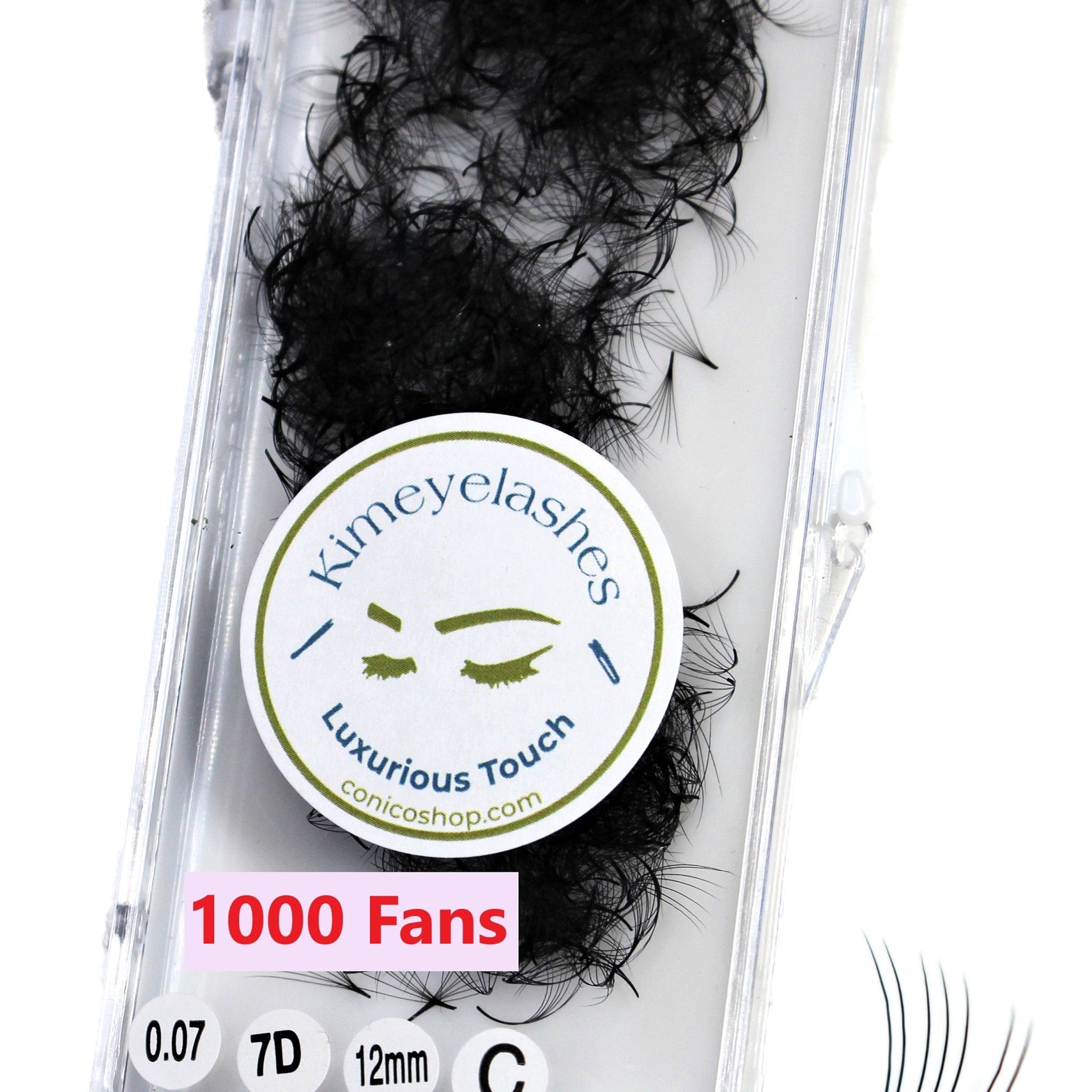 Eyelash extensions in black, with clear plastic packaging and "Kimeyelashes" logo visible