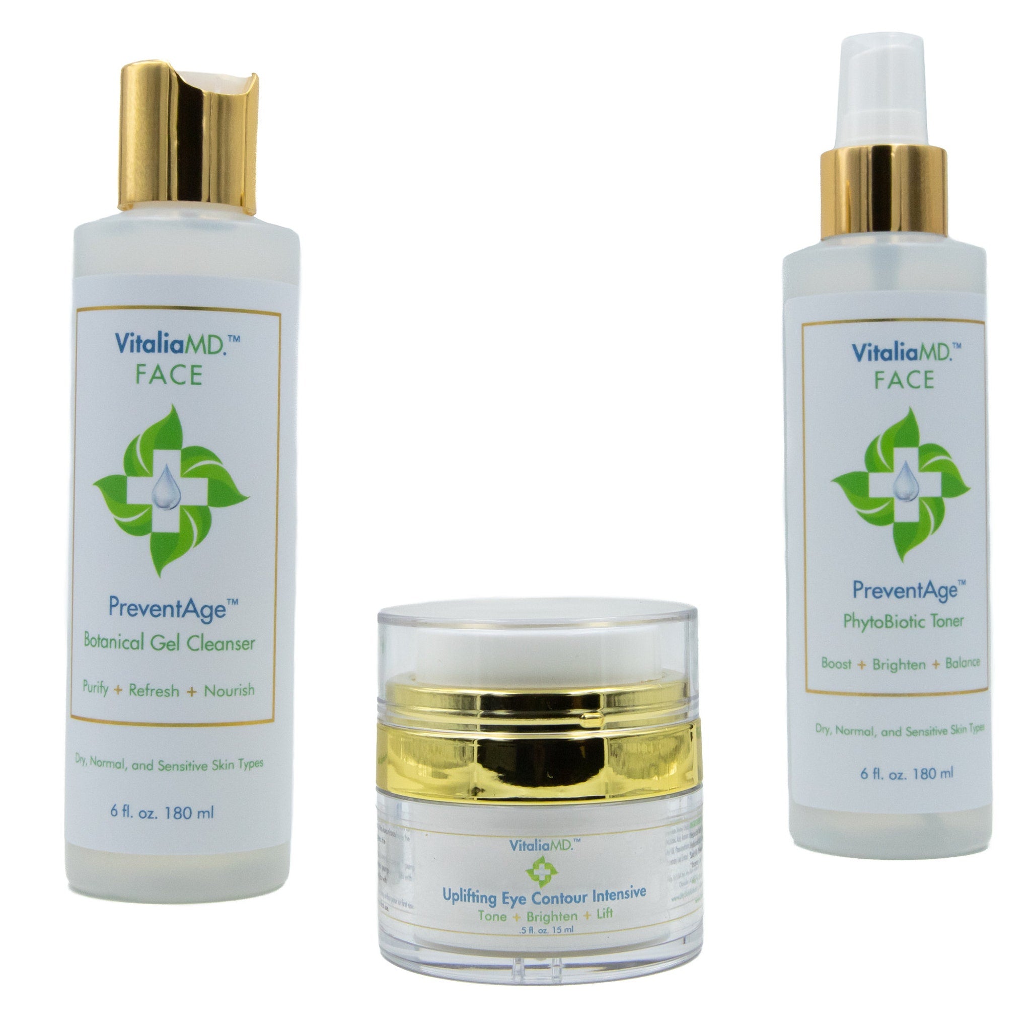 Skincare set with white bottles, gold caps, and VitaliaMD branding displayed