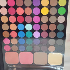 Open eyeshadow palette displaying 68 matte shades in rich hues arranged by color gradient