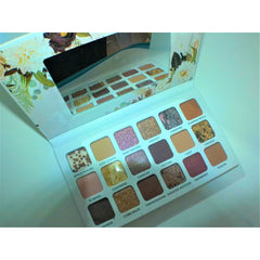 Beauty Eyeshadow Palette featuring 12 vibrant matte and shimmer shades in a sleek black compact