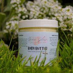 Close-up of whipped vanilla bean body butter with rich, creamy texture in a minimalist white jar