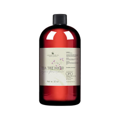 Tea Tree Water toner bottle, red glass, black cap, OPO brand label