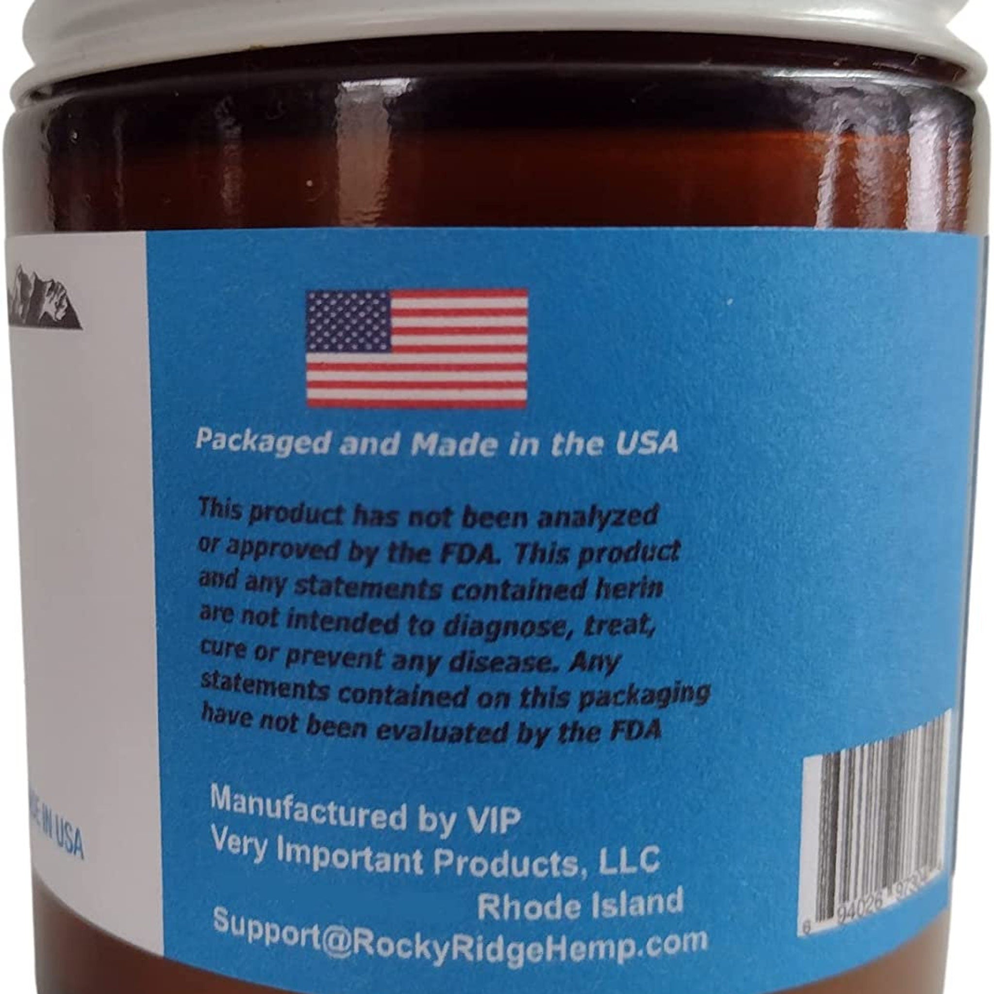 Brown jar with white lid and blue label with US flag, packaged in USA, product label visible