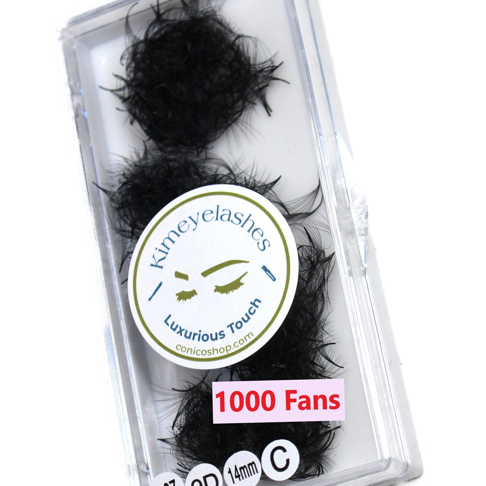 Eyelash extensions in black, packaged in a clear plastic case, with "Kimeyelashes" label and "1000 Fans" text visible