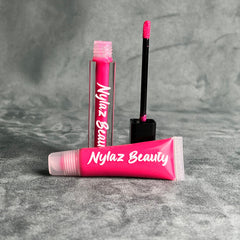 Lip gloss tubes with pink gloss, black applicator, and Nylaz Beauty text.