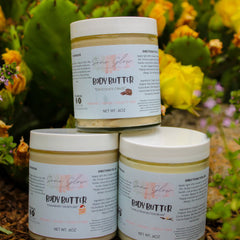 Side view of vanilla bean vegan body butter in a white jar with gold lid, showcasing whipped texture and minimalist branding