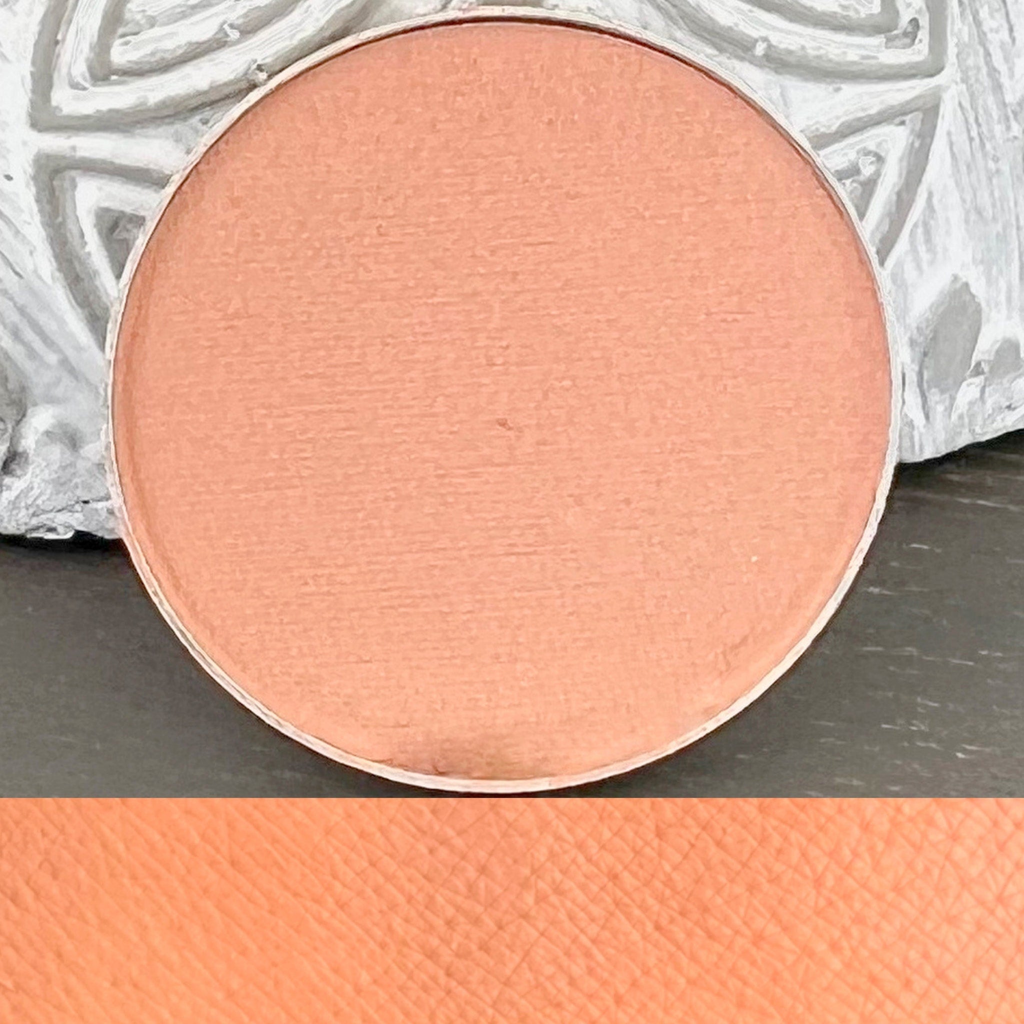 Front view of Monk Vegan Matte Eye Shadow compact in pressed powder form with cruelty-free label