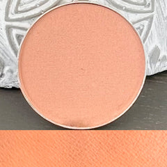 Front view of Monk Vegan Matte Eye Shadow compact in pressed powder form with cruelty-free label