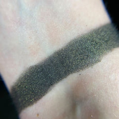 Close-up of the Black Flame Candle Eyeshadow Palette showing rich matte and shimmer black shades with smooth, blendable textures