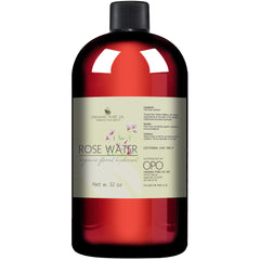 Rose water bottle, red liquid, black cap, OPO label, organic floral hydrosol